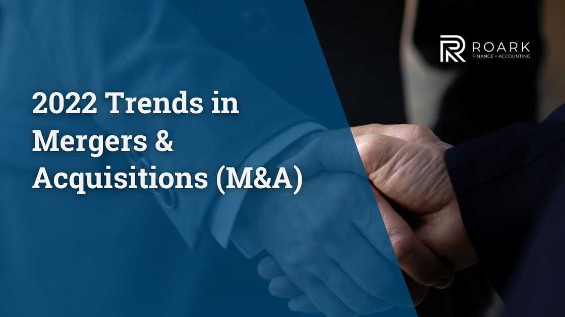 Shaking hands in a M&A transaction